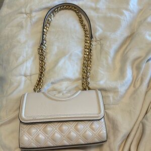 Tory Burch fleming bag in cream. Has some minor marks as shown in picture.